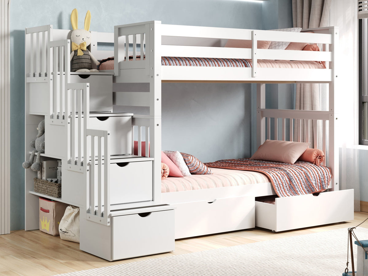 White stairway bunk bed with storage drawers in a bright children's bedroom