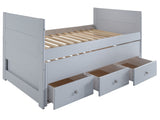 Three drawers are attached to the bed that slide out on metal glides