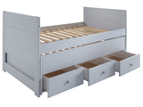 Three drawers are attached to the bed that slide out on metal glides