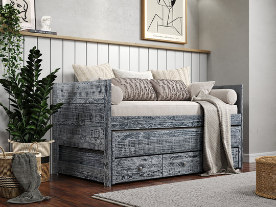 Weathered black BK551 Captain's bed with twin trundle and three storage drawers in a bedroom