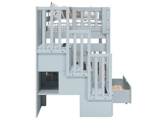 Three built-in storage drawers in the stairway of a breezy blue BK906 bunk bed