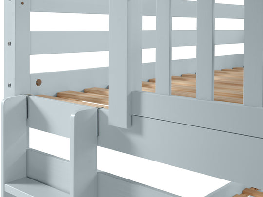 Three-step end ladder and upper-bunk entry on a breezy blue twin-over-twin bunk bed