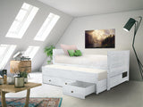Three drawers are attached to the bed that slide out on metal glides